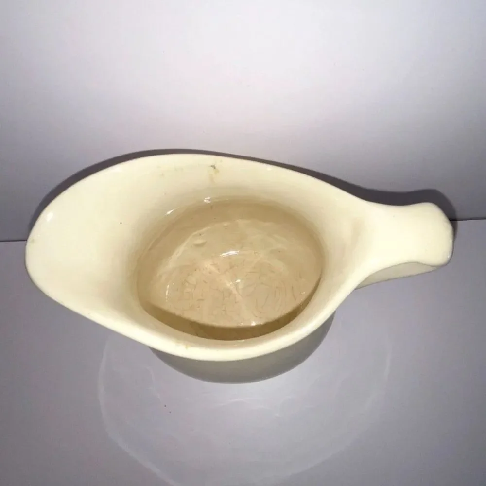 Beautiful vintage white stoneware pitcher; measures 6